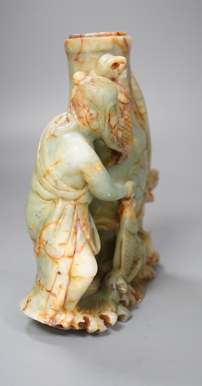 A late 19th century soapstone figural vase. 18cm